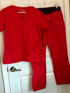 Butter-soft Red Scrub Set. Medium. Used. SEE PICTURES- Ink Stains (See Pictures)